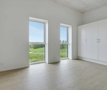 Stilrent rækkehus med god beliggenhed i Gødvad - Photo 3