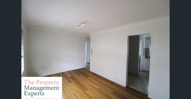 Fresh 2 bedroom apartment with garage! - Photo 1