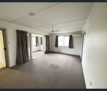 Spacious Family Home with Huge Backyard, Perfect for Kids & Pets! - Photo 1