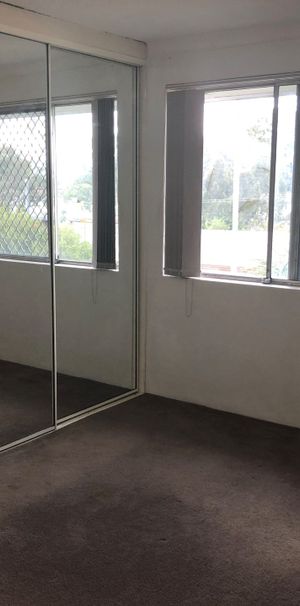 Perfectly Positioned 2-Bedroom Unit - Photo 1