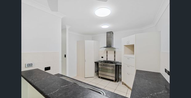 Beautiful family home with solar, batteries + powered shed - Photo 1