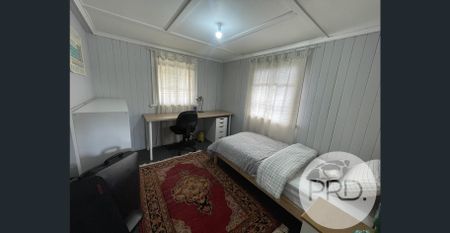 Charming Family Home with Space, Storage & Convenience - Photo 3