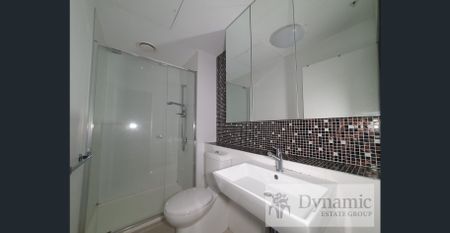 CBD Location Apartment 2 bed 1 bath Partially Furnished - Photo 5