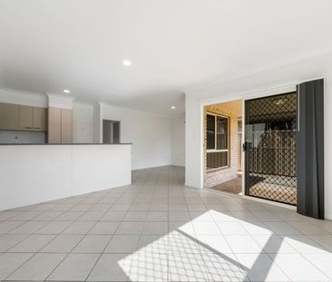 Coastal Comfort Awaits: Your Modern Haven in Woody Point - Photo 6