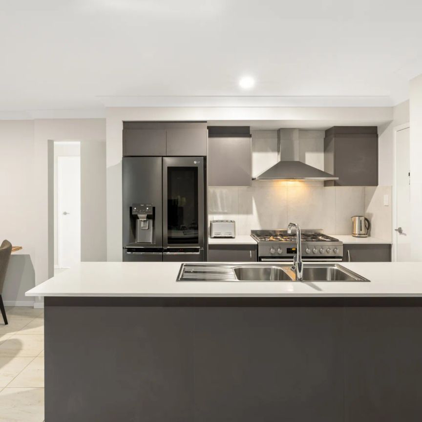 Modern Comfort Meets Functional Family Living - Photo 1