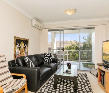 Stylish Modern Apartment in Great Location - Photo 1