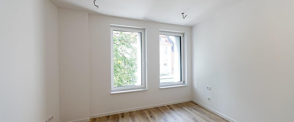 Erstbezug KfW-40-EE-Standart vollsanierten 3-Zimmer-Wohnung in zentraler Lage, zu sofort - Photo 1