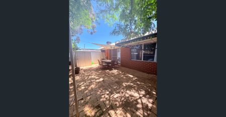 This well-maintained two-bedroom, one-bathroom home! - Photo 3