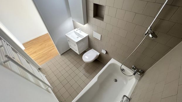 Lichtdurchflutete Attikawohnung mit zwei grossen Dachterrassen - Foto 1