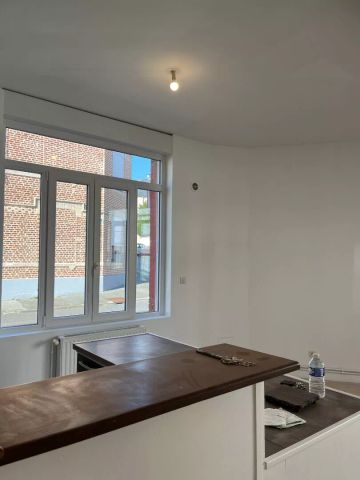 A LOUER APPARTEMENT EN RDC QUARTIER REMICOURT A ST QUENTIN 02100. - Photo 4