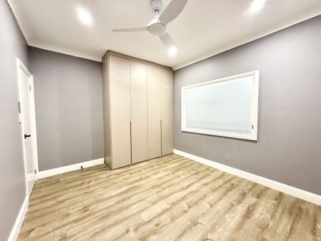 Fully Renovated Three-Bedroom Home with Carport Parking - Photo 5