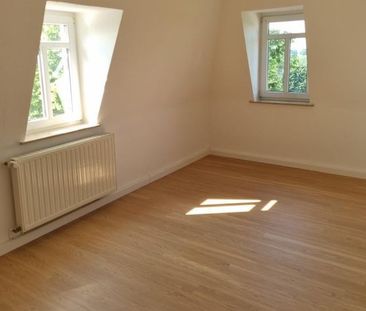 Helle, individuelle Dachgeschosswohnung mit weitem Blick in Rabenau! - Photo 1