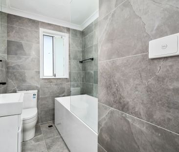 RENOVATED THREE BEDROOM HOME! - Photo 4