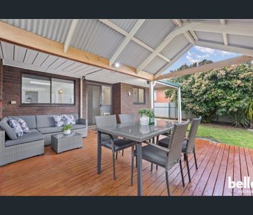 Modern 2-Bedroom Unit with Low-Maintenance Yard - Photo 6