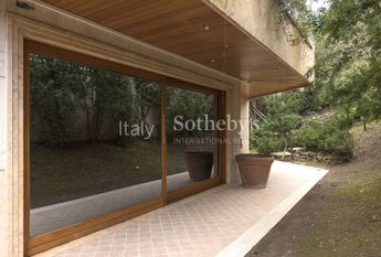 Apartment with garden and communal swimming pool