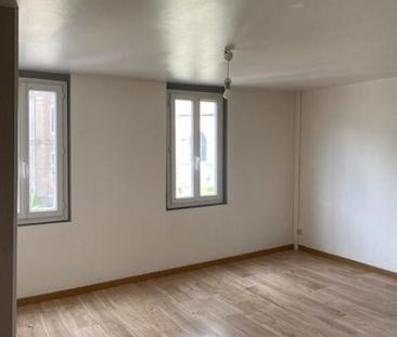 Une maison mitoyenne d'un côté située dans le Centre de Duclair - Photo 1