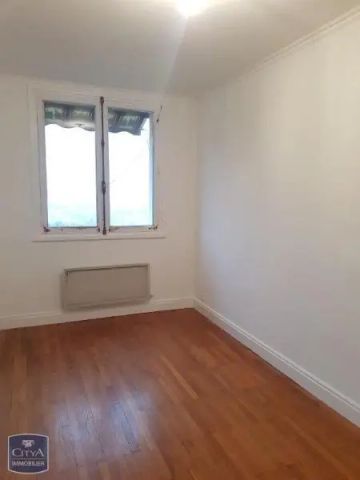 Appartement à louer 4 pièces 64m² - Photo 2