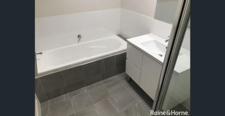 NEAR NEW 4 BEDROOM HOME - Photo 5