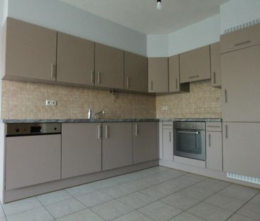 Gelijkvloers appartement met 1 slaapkamer - ondergrondse staanplaats en kelderberging - Photo 3