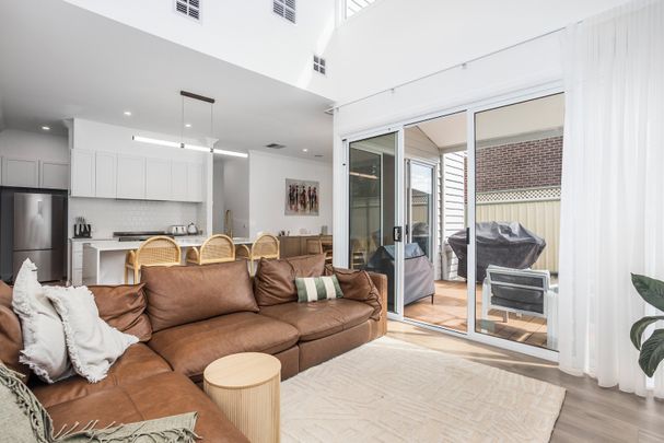 Enjoy Comfort & Space in this Beautiful 4-Bedroom Home with Study Area - Photo 1