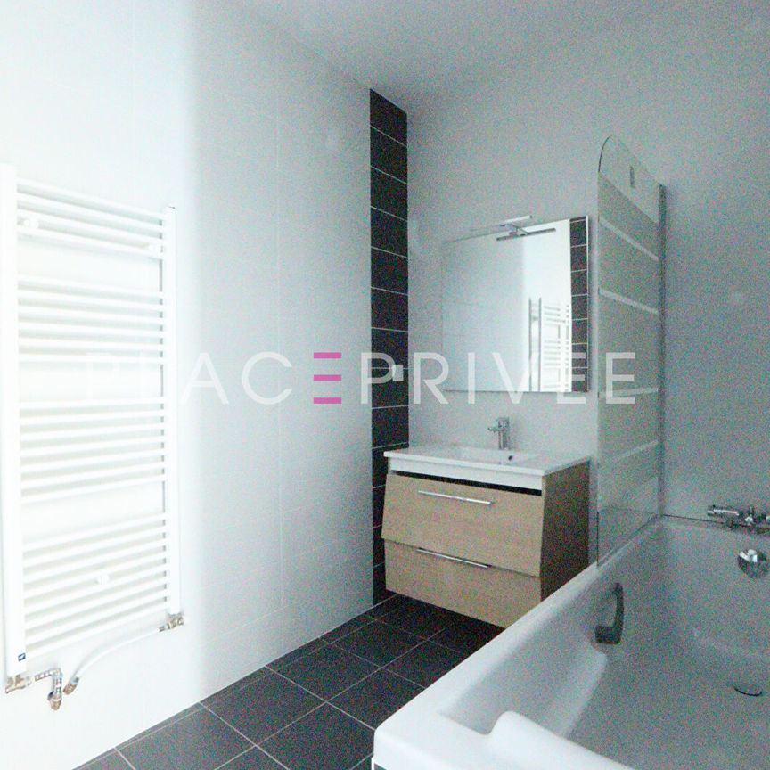 Appartement avec stationnement - Photo 1