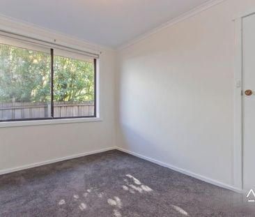 Conveniently located two-bedroom unit - Photo 3