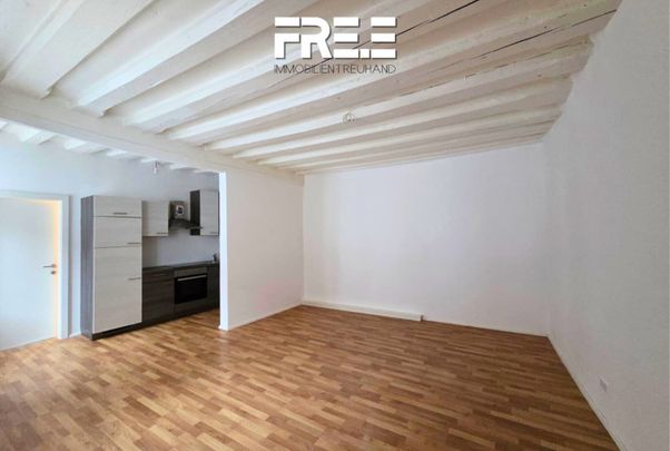 ZENTRAL | Wohnen direkt am Rathausplatz, aber mit Ausrichtung in den ruhigen Hof! - Foto 1