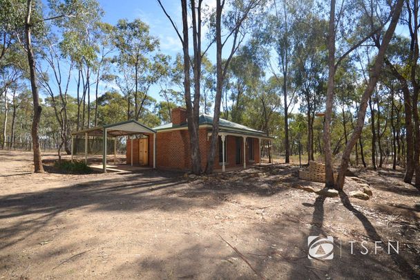 Located in a lovely quiet bush setting - Photo 1