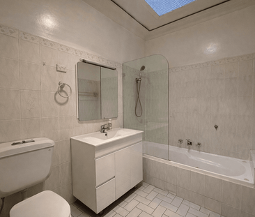 Generous Family Living with Balcony & Modern Updates - Photo 6