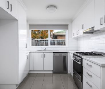 TWO BEDROOM SPACIOUS UNIT WITH DOUBLE GARAGE - Photo 2