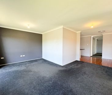 Peaceful Suburban Living in a Central, Well-Connected Location - Photo 2