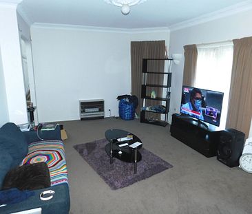 GREAT FAMILY HOME WITH TWO LIVING AREAS AND LARGE ENCLOSED YARD - Photo 2