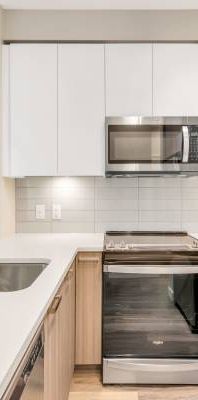 1 Bed + 1 Bath + Den @ River District! *$500 rent credit* - Photo 1