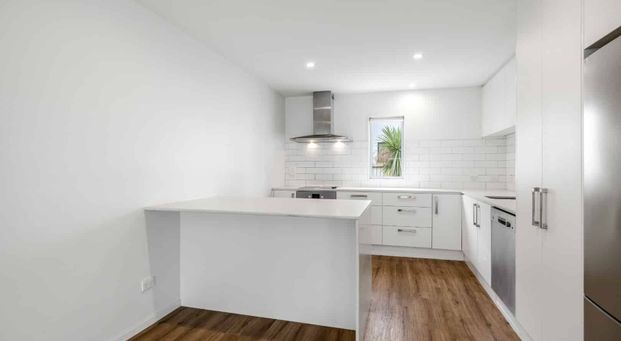 3-Bedroom Townhouse with Garage - Photo 1