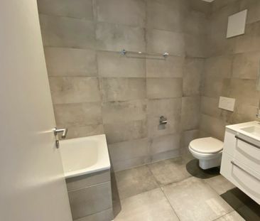 Appartement de 4.5 pièces neuf avec accès à un jardin commun - Photo 4