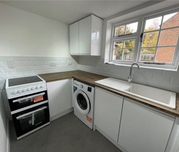 A well presented first floor one bedroom apartment situated just of... - Photo 5