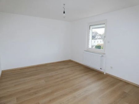 Modernisierte 3-Zimmer-Maisonette-Wohnung im gepflegten Zweifamilienhaus. - Photo 4