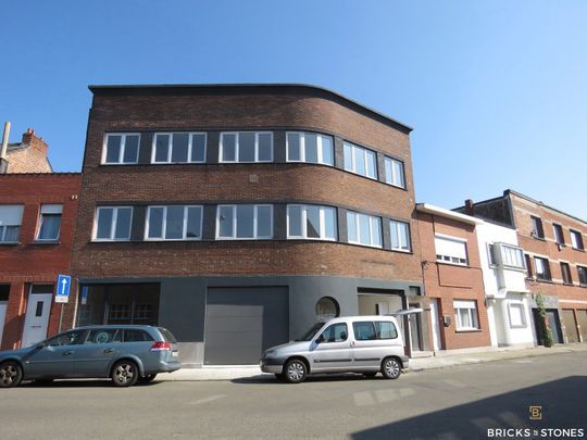 Gelijkvloers appartement met tuin en garage - Photo 1