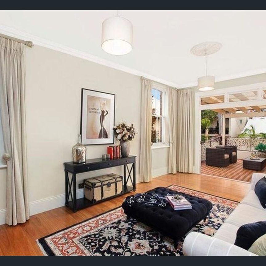 Charming Two-Bedroom Home with Modern Comforts & Period Charm - Photo 1