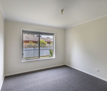 Comfortable Three Bedroom Unit - Photo 1