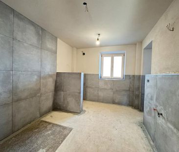 Neue großzügige 2-Zi.-EG-Gartenwohnung mit Fußbodenheizung und groß... - Foto 1