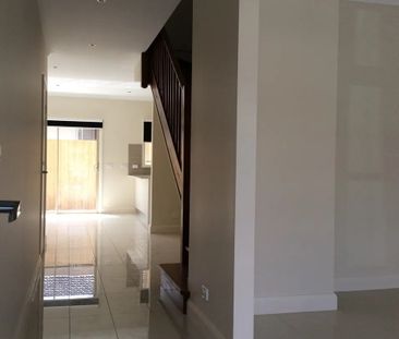 Register to Inspect // Stylish Two-Bedroom Townhouse with Dual Livi... - Photo 4