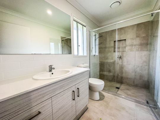 Spacious & Modern Family Home in Popular Location - Photo 1