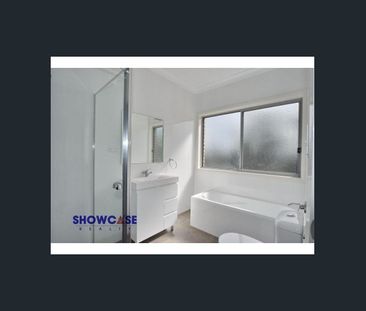 Ultra Convenient Location & Stylish Townhouse! - Photo 2