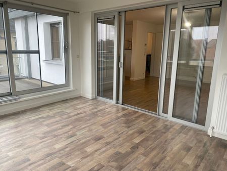 Recent vernieuwd triplex appartement met 2 slaapkamers - Photo 2