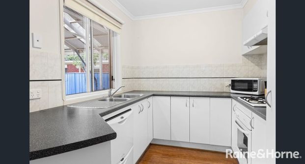 Cozy Family Home Combining Comfort & Functionality! - Photo 1