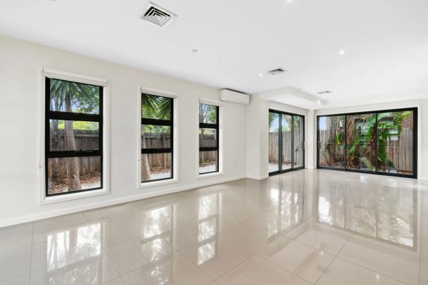 Four-Bedroom House in Convenient Location - Photo 1