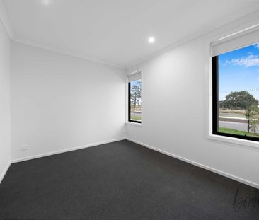 Spacious 4-Bedroom Family Home with Modern Features - Photo 1