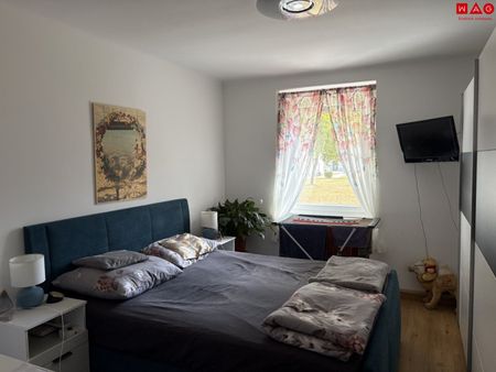 Wohlfühlen leicht gemacht: helle Räume und eine einladende Atmosphäre machen diese 2-Zimmer-Wohnung mit offener Küche zu einem schönen Zuhause in ruhiger Grünlage - ab Dezember verfügbar! - Foto 2