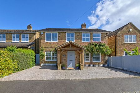 A beautifully refurbished four-bedroom family home featuring versatile living space, a stunning open-plan kitchen/dining area, separate utility room, and stylish modern interiors throughout. - Photo 2